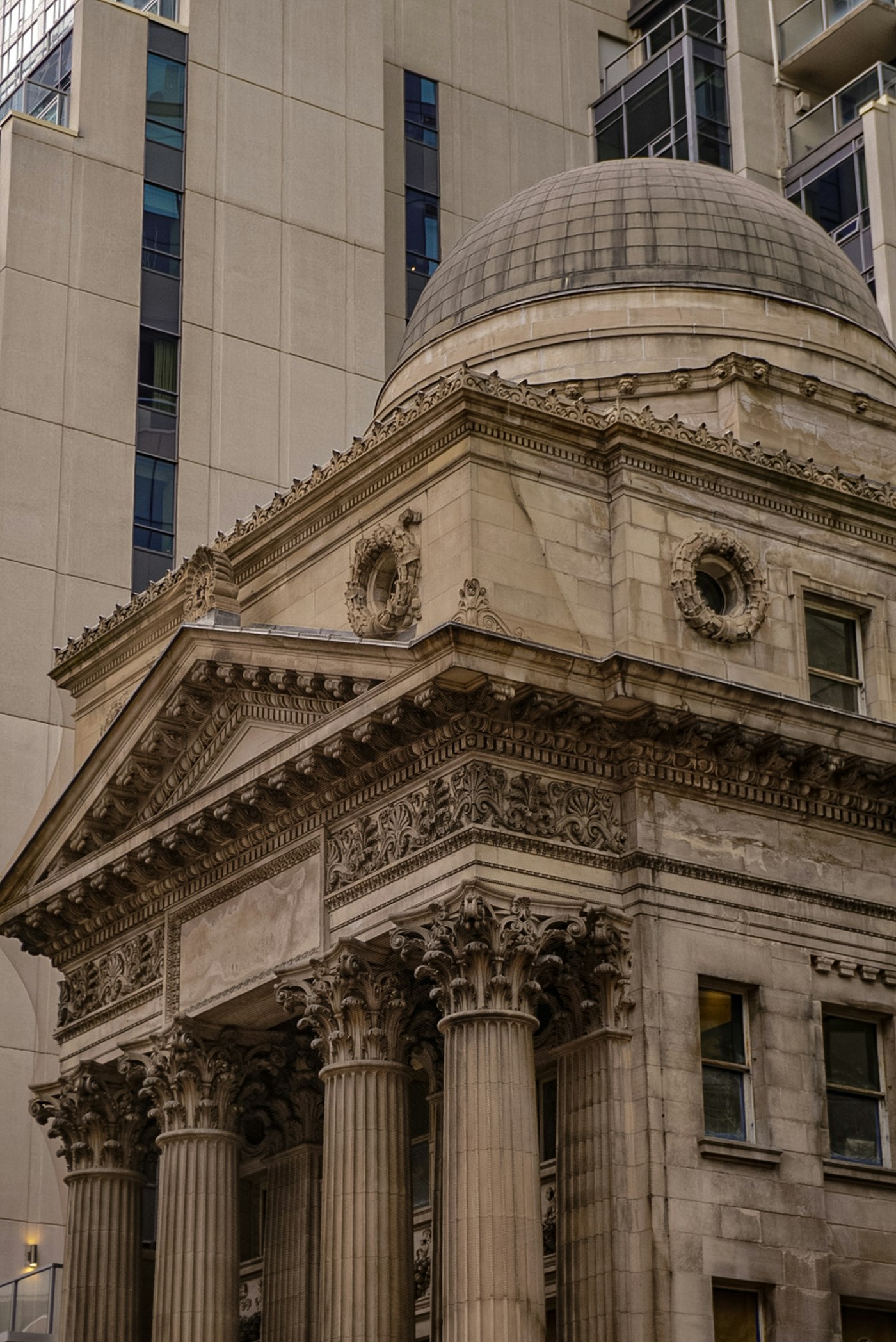 A bank building with columns and a dome